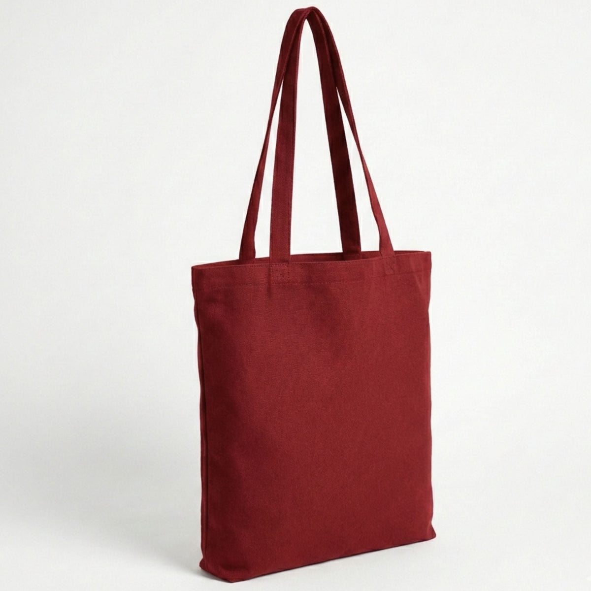 Toptan Bez Çanta marka 38x40 cm boyutlarında, %100 pamuklu, dayanıklı dikişli bordo renkli bez çanta.