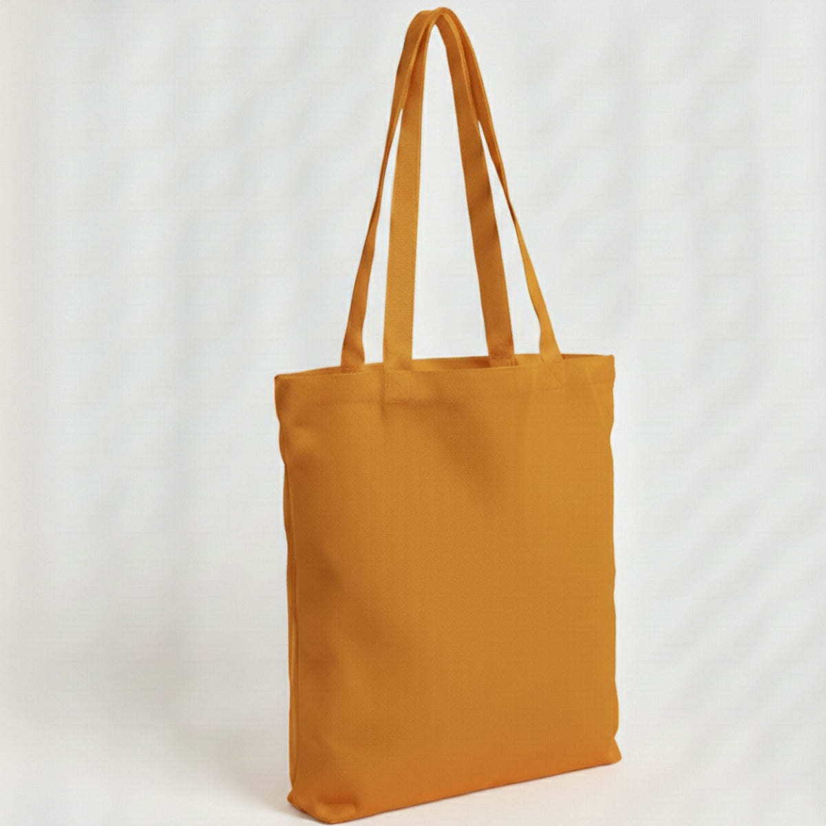 Toptan Bez Çanta marka, 38x40 cm boyutlarında, 140 gram %100 pamuklu kumaştan üretilmiş hardal sarısı bez çanta.